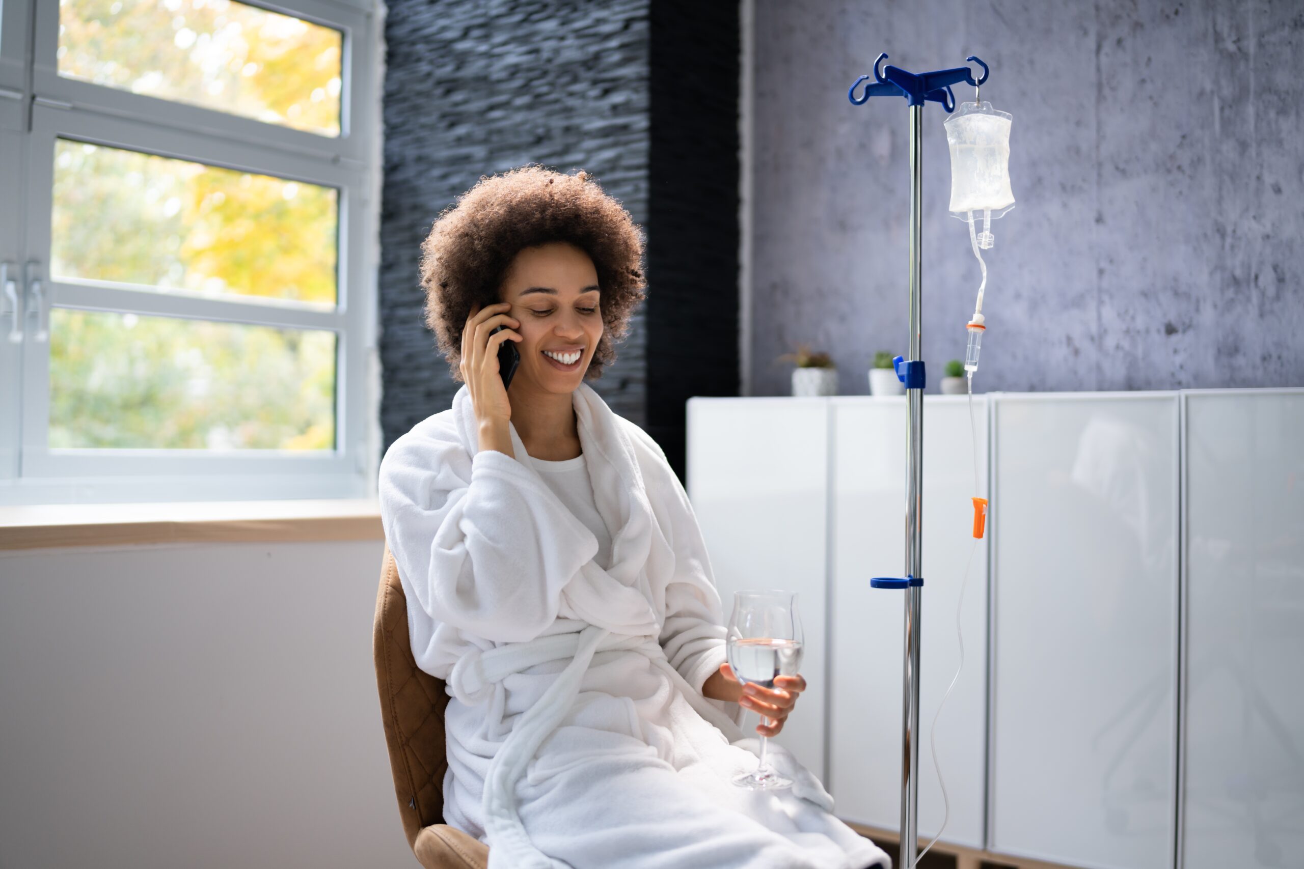 A lady exploring IV Therapy Drips and Hydration Solutions at 88 IV Therapy